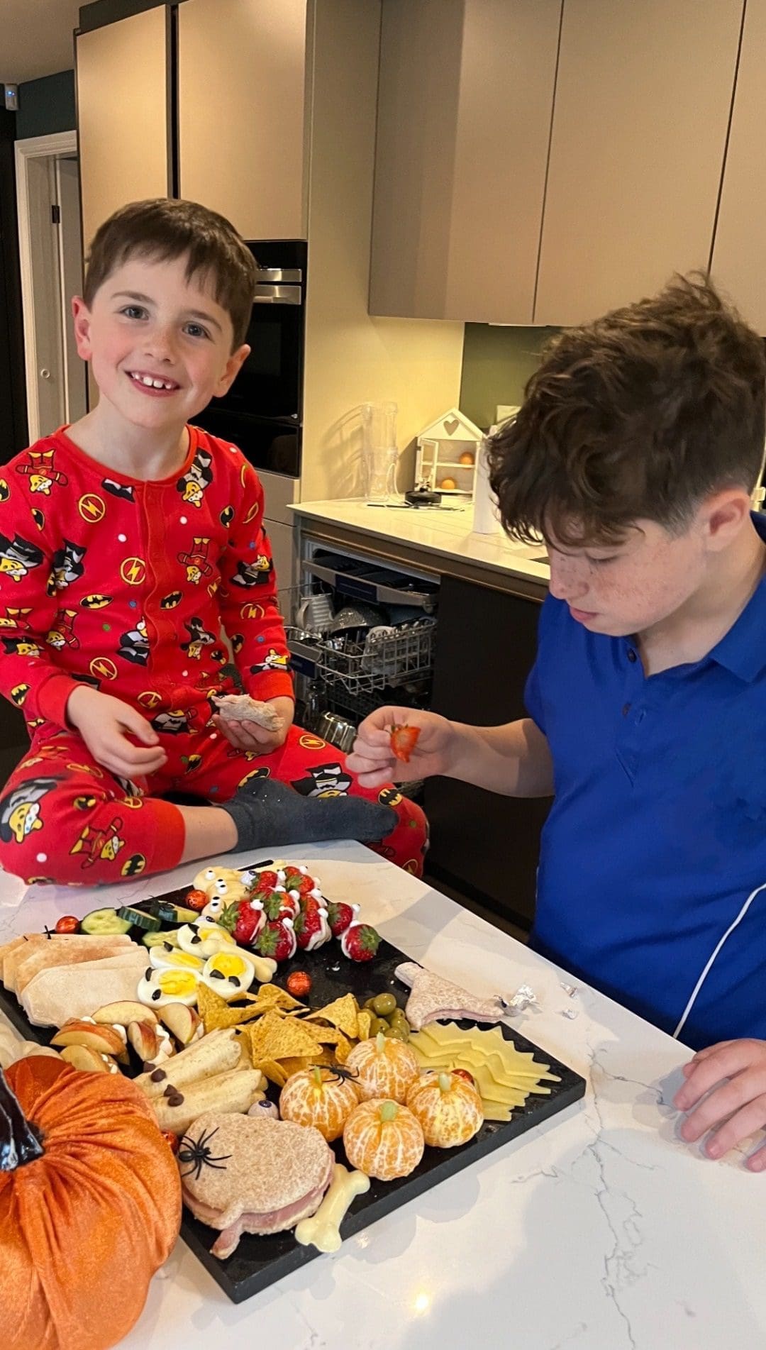 Kate Devine's Kids tucking into a healthy halloween platter